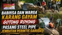 Babinsa dan Warga Karang Gayam Gotong Royong Pasang Steel Pipe Jembatan Perintis Garuda