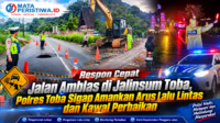 Respon Cepat Jalan Amblas di Jalinsum Toba, Polres Toba Sigap Amankan Arus Lalu Lintas dan Kawal Perbaikan
